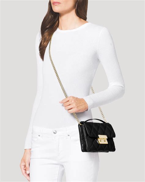 michael kors sloan editor small saddle crossbody|Sloan Small Quilted Leather Crossbody Bag .